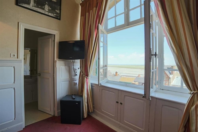 Imagen de la habitación del Hotel La Confiance. Foto 11