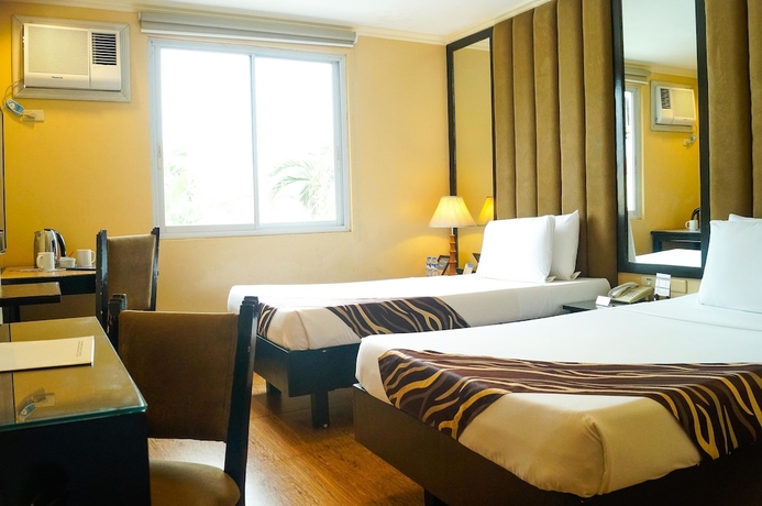 Imagen de la habitación del Hotel La Corona De Lipa. Foto 7