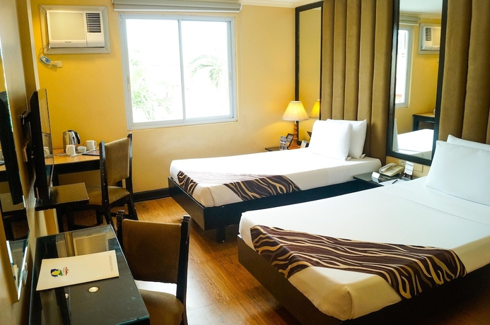 Imagen de la habitación del Hotel La Corona De Lipa. Foto 12
