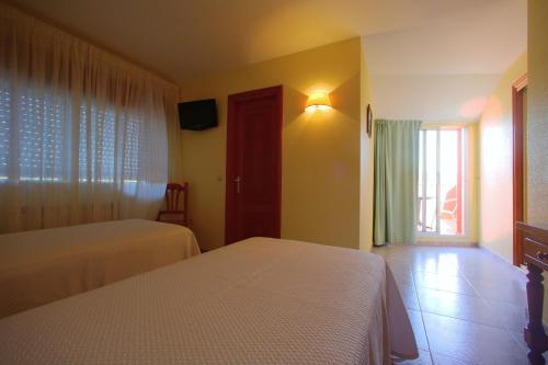 Imagen de la habitación del Hotel La Costera, Lanzada. Foto 7