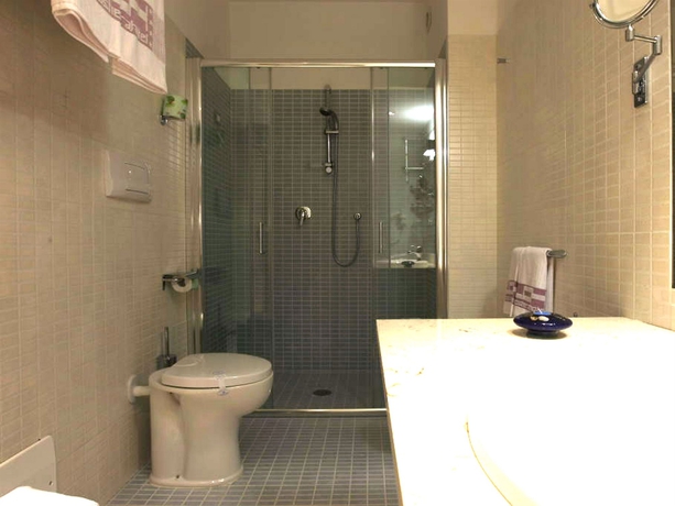 Imagen de la habitación del Hotel La Costiera. Foto 10