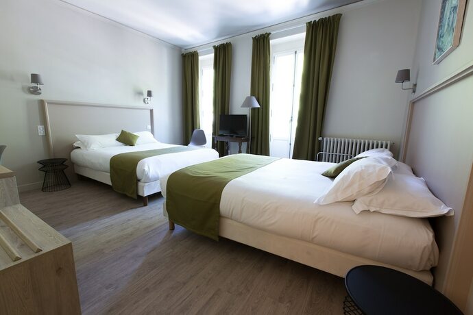 Imagen de la habitación del Hotel La Cour de la Paix. Foto 16
