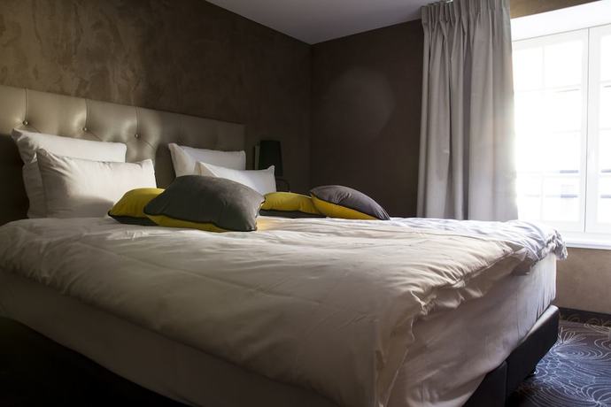 Imagen de la habitación del Hotel La Couronne. Foto 7