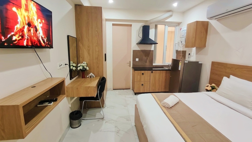 Imagen de la habitación del Hotel La Cozy Residency. Foto 9