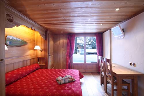 Imagen de la habitación del Hotel La Crémaillère, Megeve. Foto 2