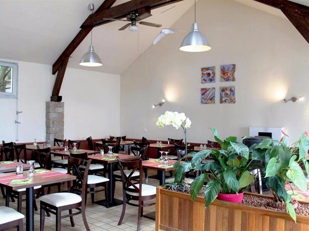 Imagen del bar/restaurante del Hotel La Croix Du Sud, Le Tour du parc. Foto 3