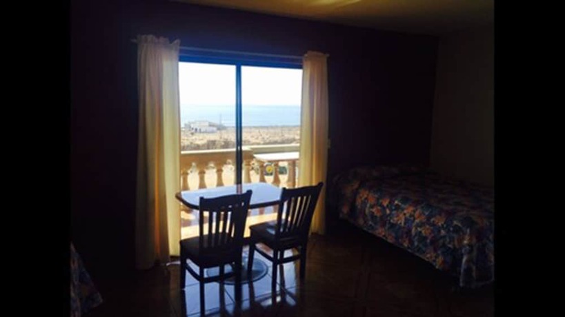 Imagen de la habitación del Hotel La Cueva Del Pirata. Foto 10