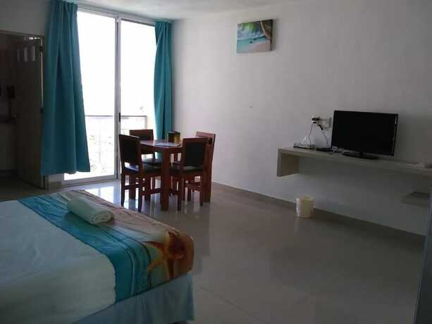 Imagen de la habitación del Hotel La Cultura Suites - Avenida Quinta. Foto 12