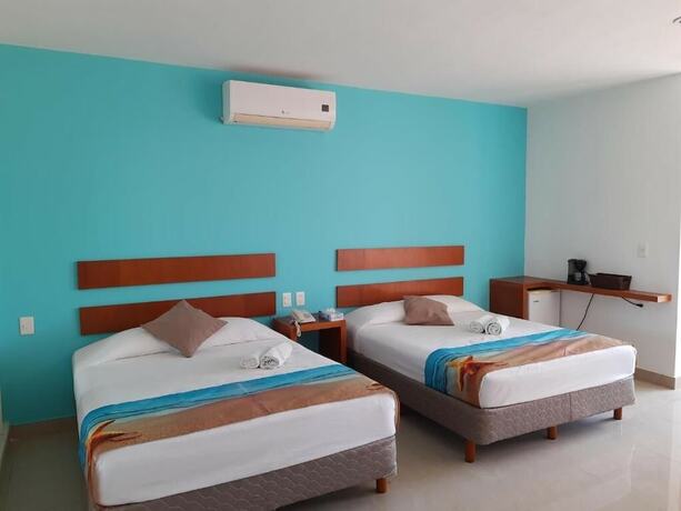 Imagen de la habitación del Hotel La Cultura Suites - Avenida Quinta. Foto 13