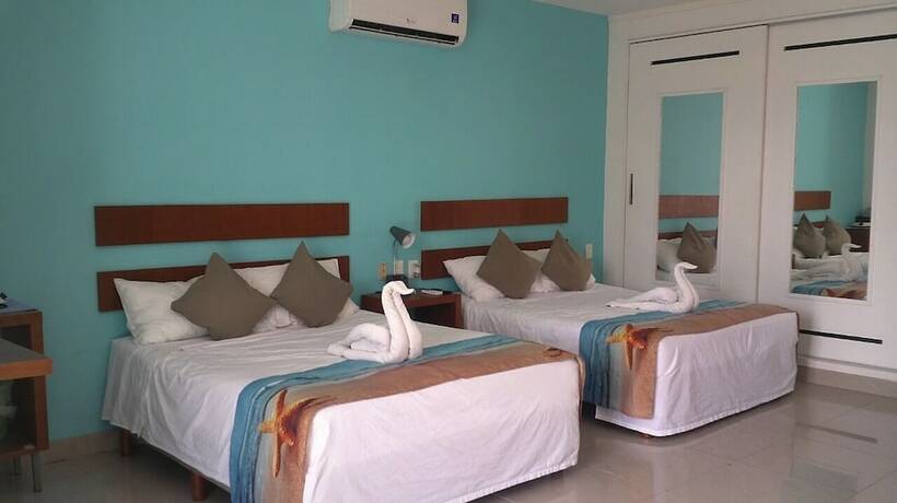 Imagen de la habitación del Hotel La Cultura Suites - Avenida Quinta. Foto 17