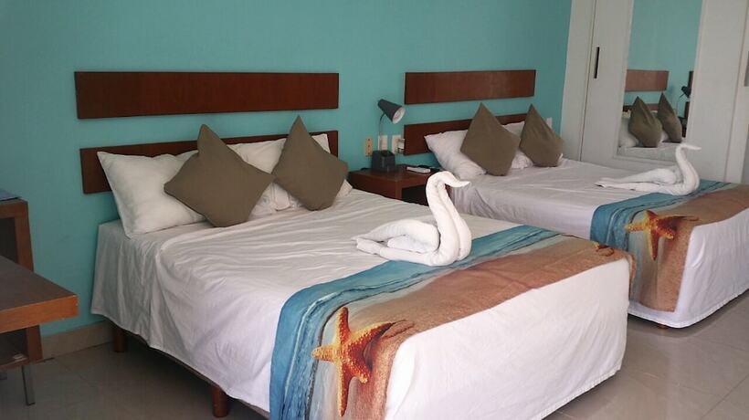 Imagen de la habitación del Hotel La Cultura Suites - Avenida Quinta. Foto 19