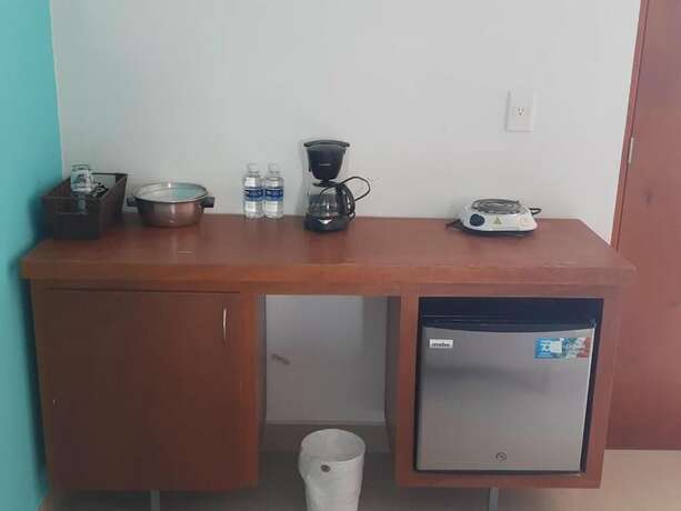 Imagen de la habitación del Hotel La Cultura Suites - Avenida Quinta. Foto 20
