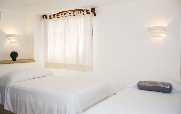 Imagen de la habitación del Hotel La Cultura Suites - Playa Y Mar. Foto 4