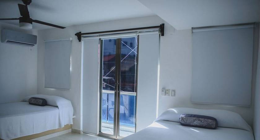 Imagen de la habitación del Hotel La Cultura Suites - Playa Y Mar. Foto 5