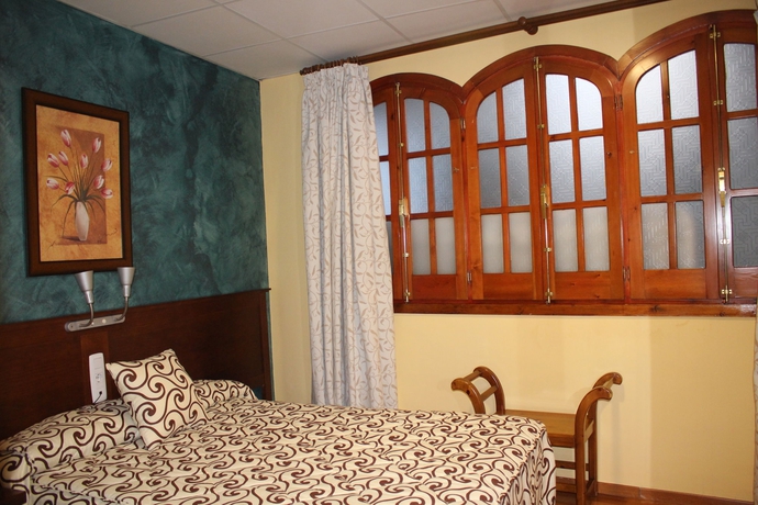 Imagen de la habitación del Hotel La Curva. Foto 11