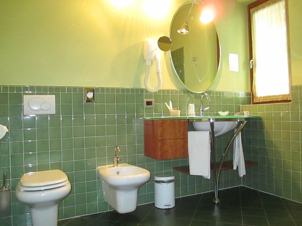 Imagen de la habitación del Hotel La Darsena Boutique and Restaurant. Foto 3