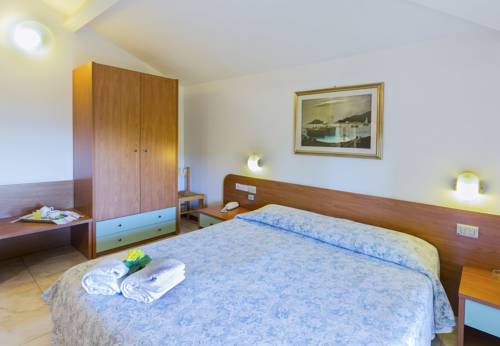 Imagen de la habitación del Hotel La Darsena, Passignano Sul Trasimeno. Foto 7