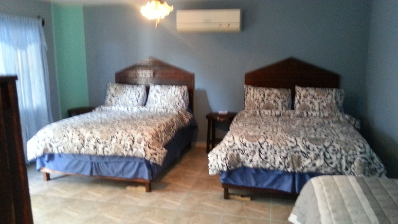 Imagen de la habitación del Hotel La Delphina Bandb Bar and Grill. Foto 3