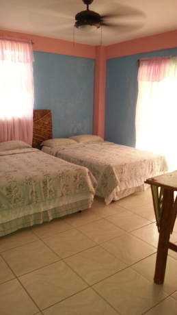 Imagen de la habitación del Hotel La Delphina Bandb Bar and Grill. Foto 5