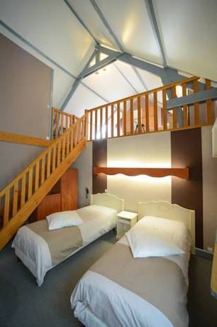 Imagen de la habitación del Hotel La Demeure Du Perron. Foto 4