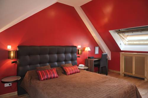 Imagen de la habitación del Hotel La Diligence, La Ferte-Saint-Cyr. Foto 6