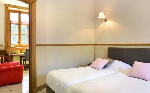 Imagen de la habitación del Hotel La Diligence, La Ferte-Saint-Cyr. Foto 8