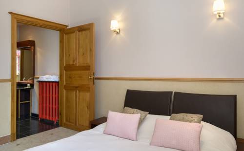 Imagen de la habitación del Hotel La Diligence, La Ferte-Saint-Cyr. Foto 9
