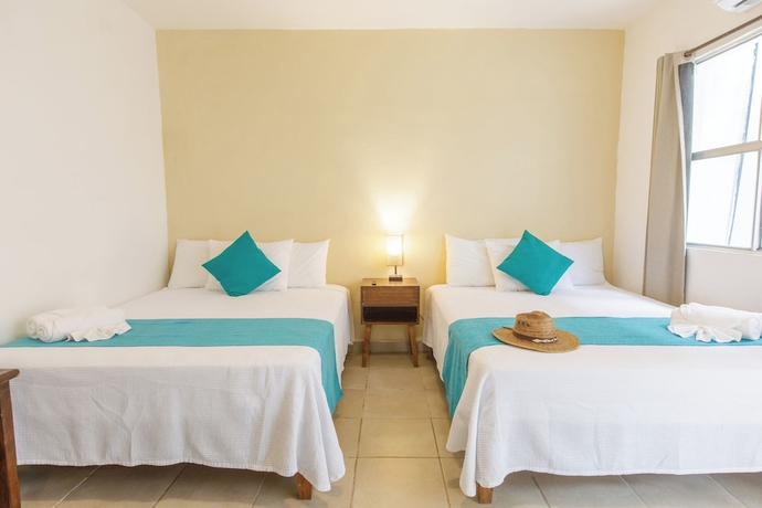 Imagen de la habitación del Hotel La Diosa Kali Beach Front. Foto 8
