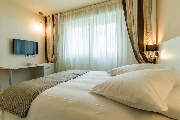 Imagen de la habitación del Hotel La Dolce Vita. Foto 13