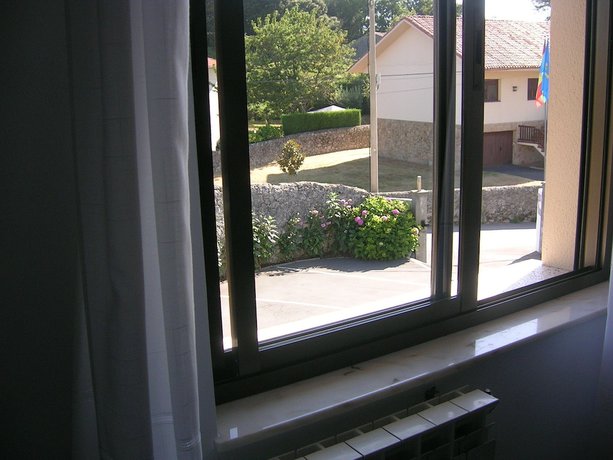 Imagen de la habitación del Hotel La Encina. Foto 9