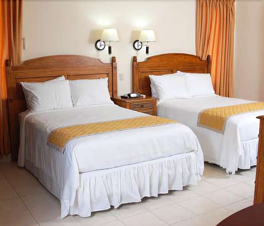 Imagen de la habitación del Hotel La Ensenada Beach Resort- All Inclusive. Foto 9