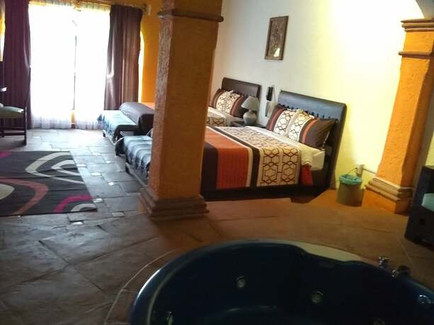 Imagen de la habitación del Hotel La Escondida. Foto 15