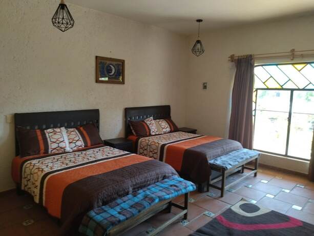 Imagen de la habitación del Hotel La Escondida. Foto 16