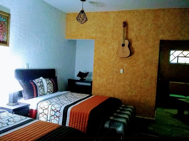 Imagen de la habitación del Hotel La Escondida. Foto 17