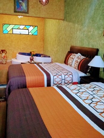 Imagen de la habitación del Hotel La Escondida. Foto 20