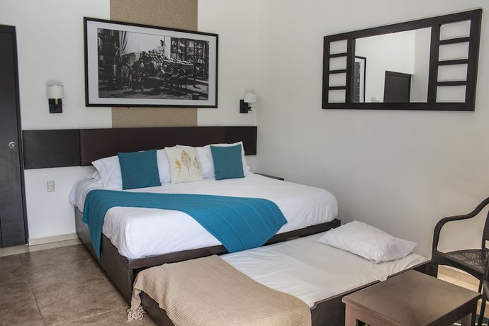 Imagen de la habitación del Hotel La Esmeralda en el Encanto Petit. Foto 6