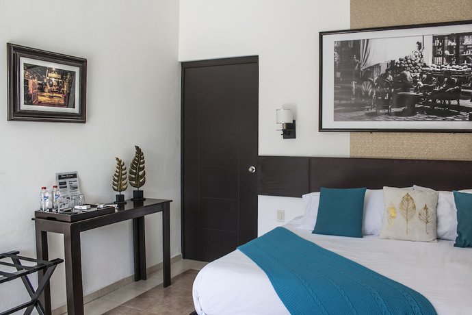 Imagen de la habitación del Hotel La Esmeralda en el Encanto Petit. Foto 12