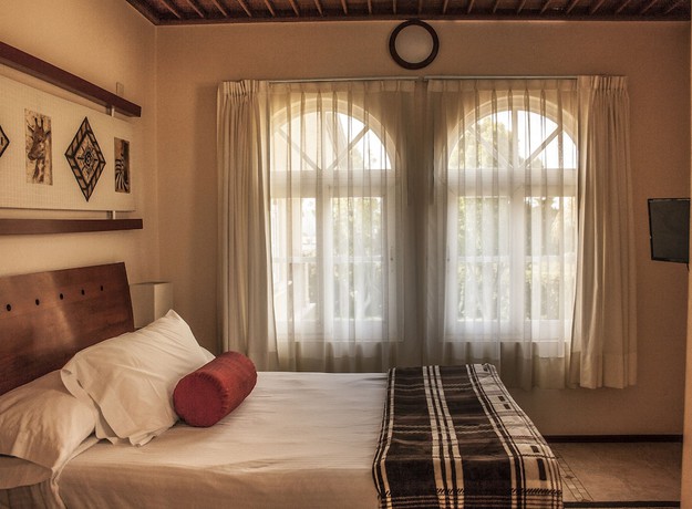 Imagen de la habitación del Hotel La Esmeralda en el Encanto Petit. Foto 17