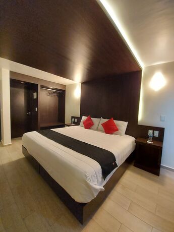 Imagen de la habitación del Hotel La Estancia Zacatlan. Foto 11