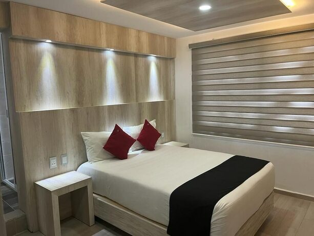 Imagen de la habitación del Hotel La Estancia Zacatlan. Foto 13