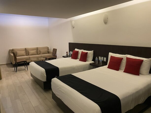 Imagen de la habitación del Hotel La Estancia Zacatlan. Foto 14