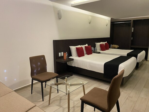 Imagen de la habitación del Hotel La Estancia Zacatlan. Foto 19