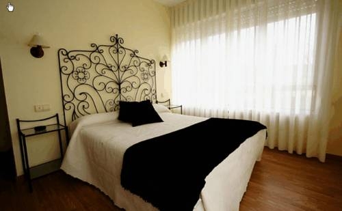 Imagen de la habitación del Hotel La Farola Del Mar. Foto 9