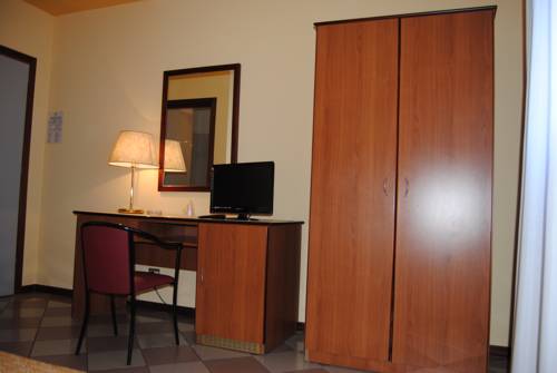 Imagen de la habitación del Hotel La Fenice, Spezzano. Foto 7