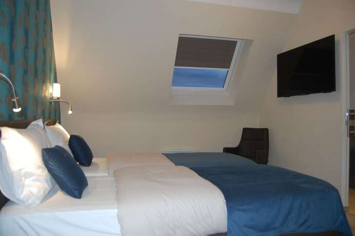Imagen de la habitación del Hotel La Ferme Delgueule. Foto 17