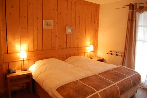 Imagen de la habitación del Hotel La Ferme. Foto 3