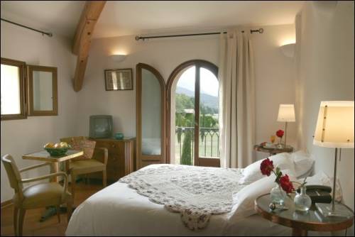 Imagen de la habitación del Hotel La Ferme Rose-hôtel De Charme. Foto 10