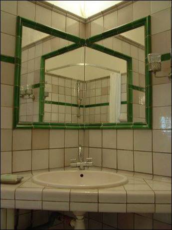 Imagen de la habitación del Hotel La Ferme Rose-hôtel De Charme. Foto 14