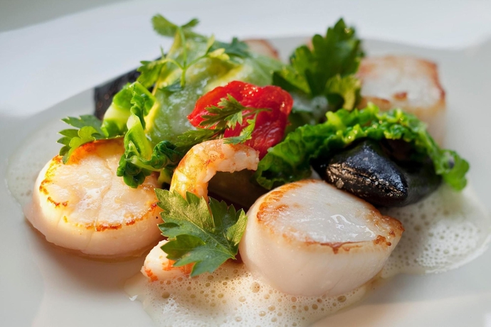 Imagen del bar/restaurante del Hotel La Ferme Saint Simeon. Foto 2