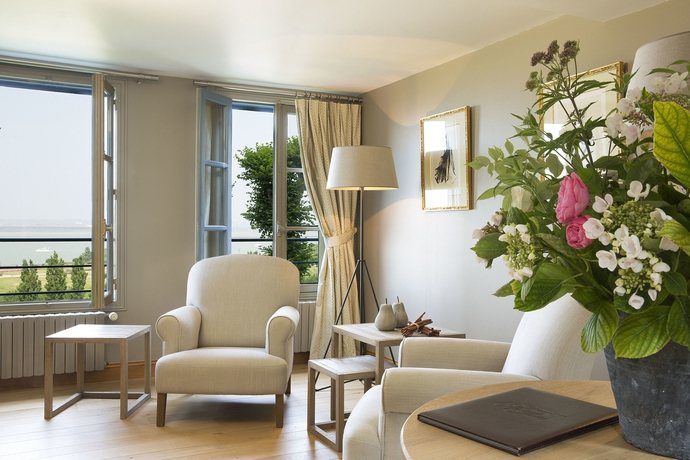 Imagen de la habitación del Hotel La Ferme Saint Simeon. Foto 6